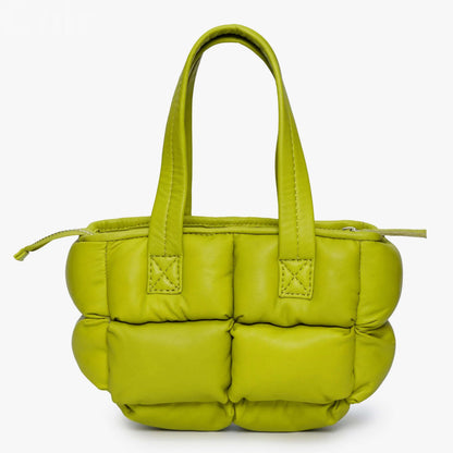 Lime green leather crossbody bag with quilted design and dual handles, perfect for a stylish and compact accessory.