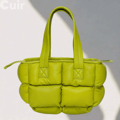 Lime green leather crossbody bag with padded design, perfect for stylish and compact hands-free storage.